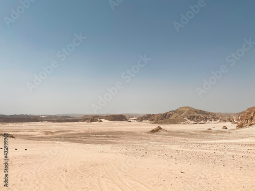 Mobile photography of Sinai desert in Dahab, Egypt. Mountains in the Sinai desert, as touristic wallpaper from safari trip. Journey in hot and warm desert with mountains and sand. 