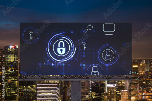 Padlock icon hologram on road billboard over panorama city view of Singapore at night to protect business, Southeast Asia. The concept of information security shields.