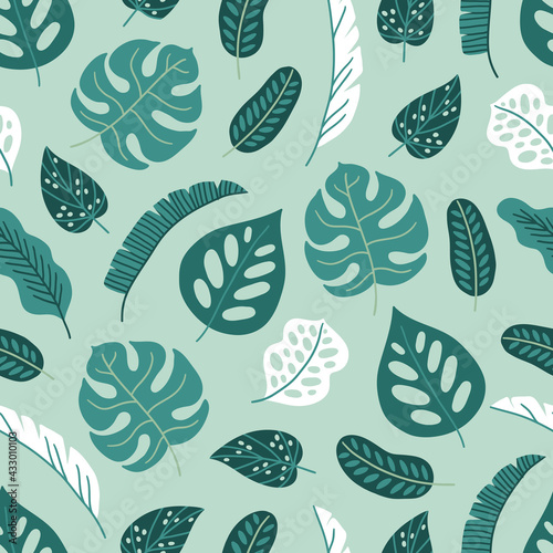 Tropical seamless pattern with palm and monstera leaves. Scandinavian style