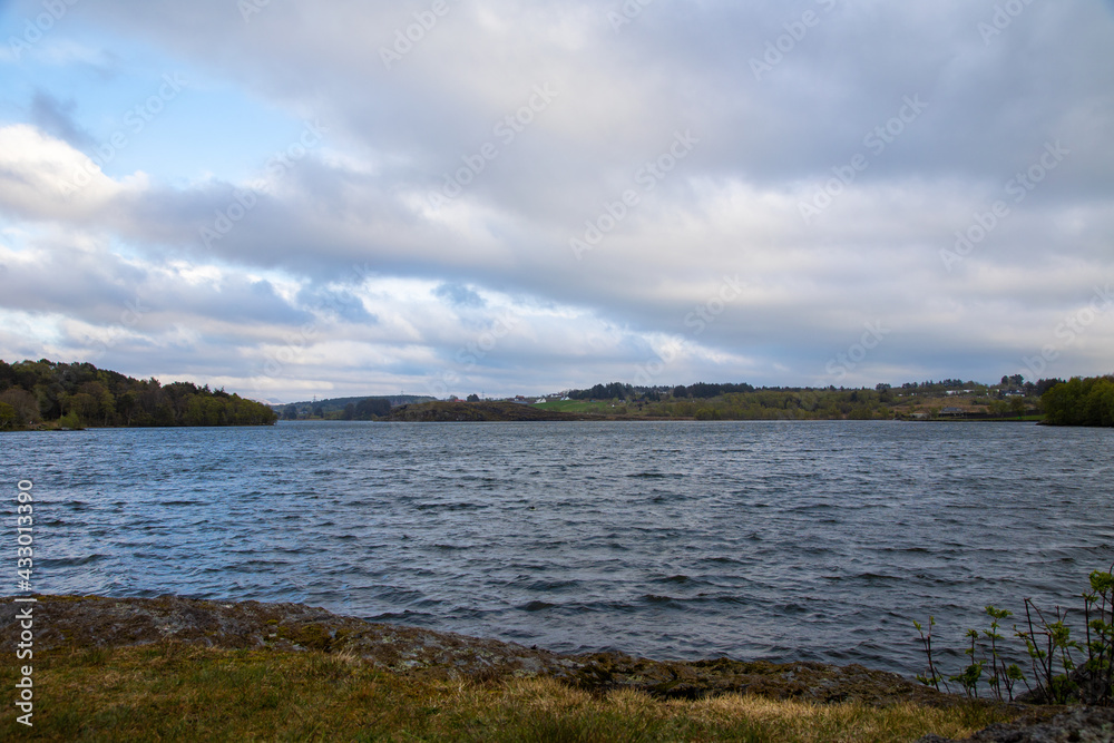 Storm on a spring day by a lake in Stavanger 