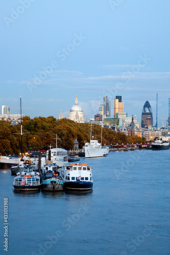 Vertical crop of river terms with skyline behind © chris