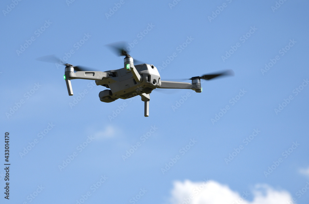drone with integrated video camera in flight drone with integrated video camera in flight
