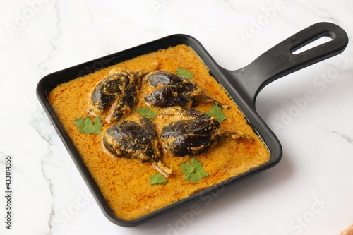 Baghare baingan, Baingan masala, Eggplant or brinjal curry, Bharli vangi. Khare vanga served in pan. Copy space. photo