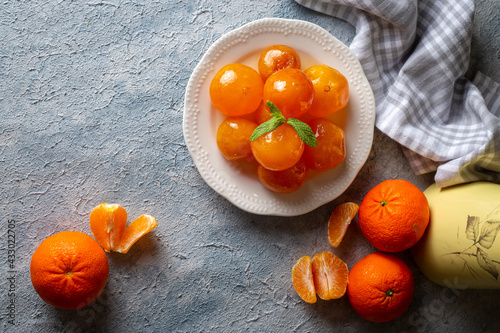 Tangerine jam in glass jar ...