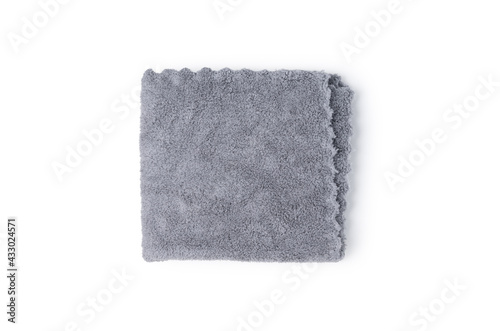 Top view gray color towel on isolated white background