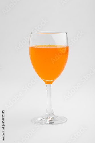 Orange juice glass, isolated on white background 