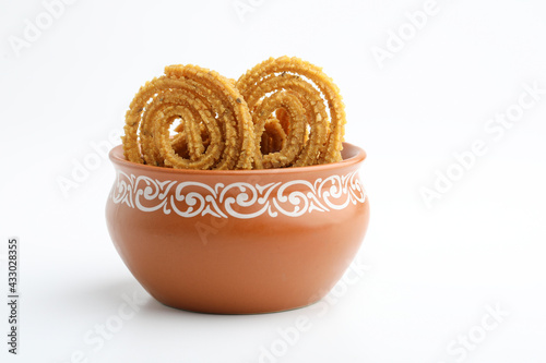 Traditional Indian Diwali snacks Chakali or murukku  Indian Traditional Tea Time Snack Chakli photo