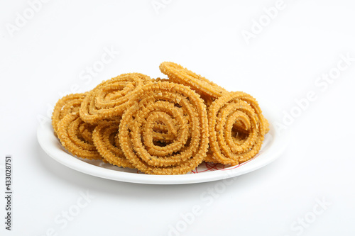 Traditional Indian Diwali snacks Chakali or murukku  Indian Traditional Tea Time Snack Chakli photo