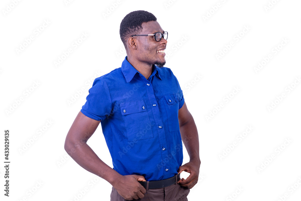 young businessman looking aside while smiling. young businessman looking aside while smiling.