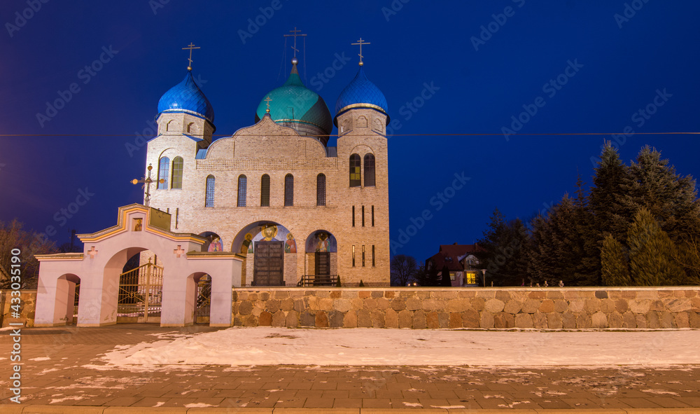 a powerful Orthodox church against the background of the blue sky
