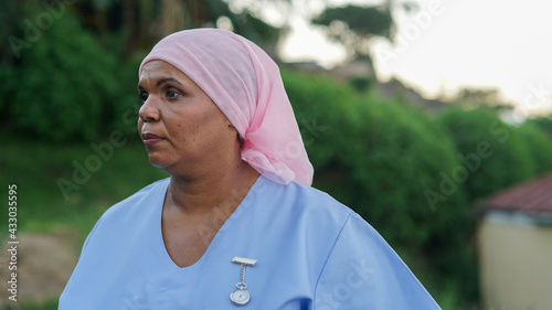 Portrait of Nurse in Scrubs prepared to leave Home for Work
