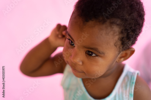 Closeup of black toddler with short hair