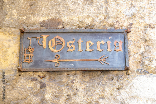 Metal sign with writing Osteria photo