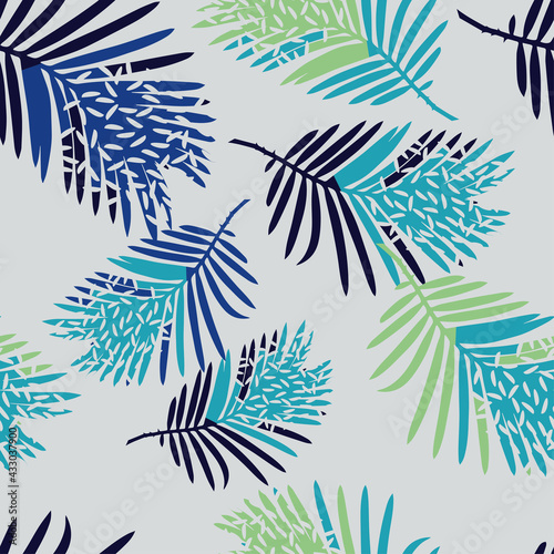 Seamless pattern with tropical palm leaves. Beautiful exotic plants. Trendy summer Hawaii print. Textile. Vector illustration for web design or print.