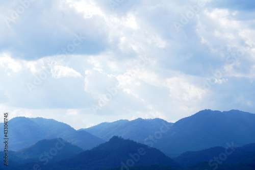 Fototapeta Naklejka Na Ścianę i Meble -  Clouds blue sky with mountain view.   