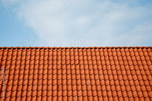 Red tile roof horizontally blue sky  800 