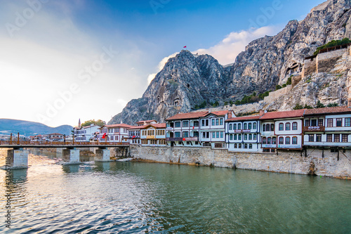 Old Ottoman houses evening panoramic view by the Yesilirmak River in Amasya City. Amasya is populer tourist destination in Turkey.