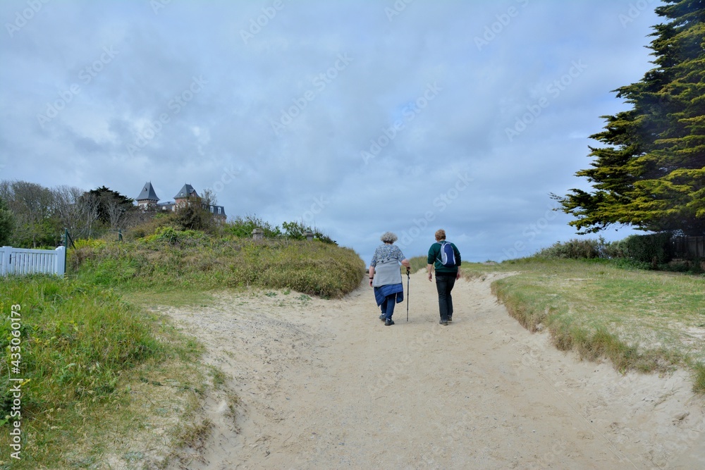 Group of retired hikers at seaside in Brittany. France