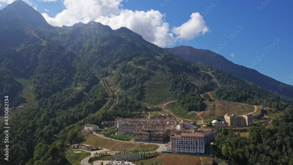 Krasnaya Polyana resort from above, mountain resort, modern beautiful buildings Krasnaya Polyana resort from above, mountain resort, modern beautiful buildings