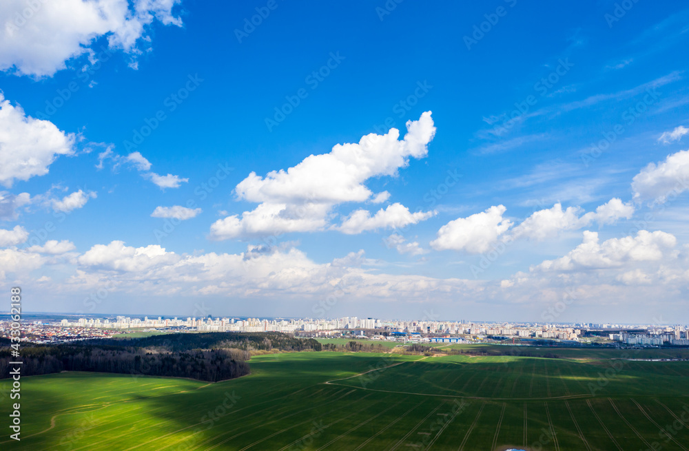 Aerial view of agricultural landscape with fields in spring season.