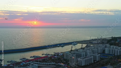 Imeretian yacht port and Adler at sunset from above photo