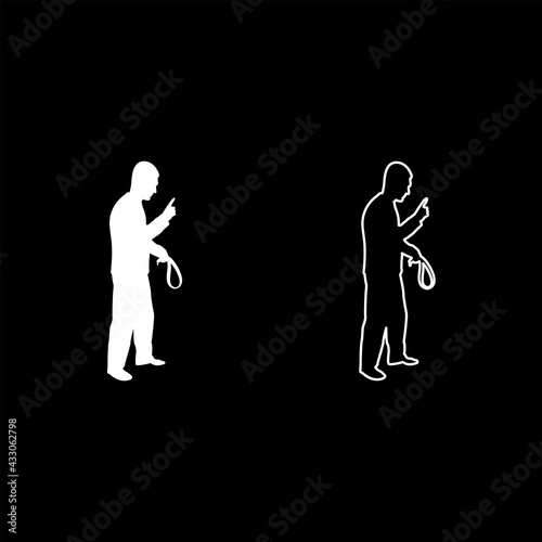 Angry man with belt in hand for punishment warns showing index finger Violence in family concept Abuse idea Domestic trouble Fury male threatening victim Social problem Husband father emotionally 