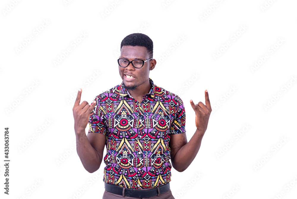 portrait of a young man showing victory gesture portrait of a young man showing victory gesture