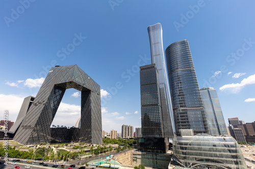 Glass-walled modern skyscrapers frame the urban skyline of Beijing's Business and Economic District.
 photo