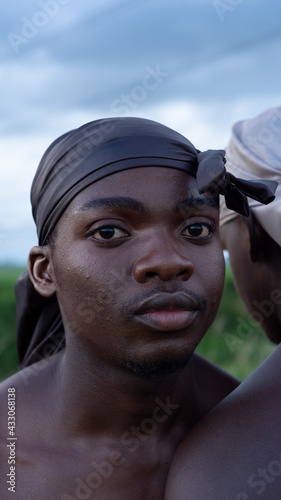 Closeup of young man in do-rag