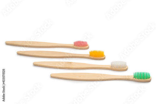 Bamboo toothbrush isolated on a white background.