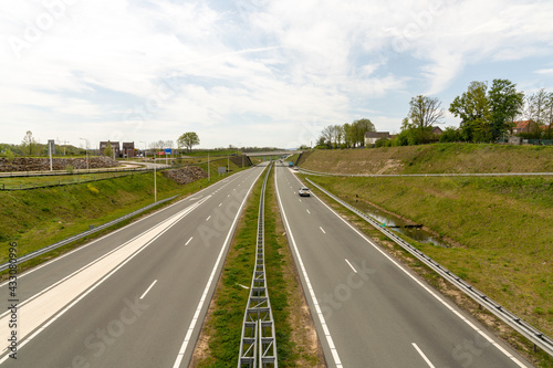 clean and modern highway in the southern Netherlands with very little traffic
