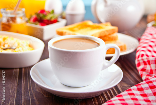 Wallpaper Mural Cup of tea and scrambled eggs and with crispy toast. Breakfast concept. Torontodigital.ca