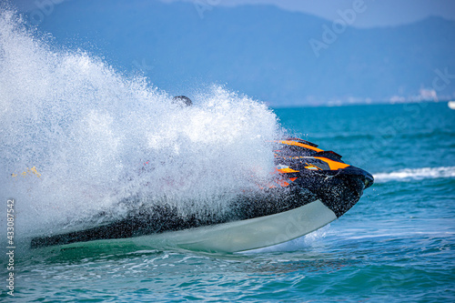 A man driving a jet ski
