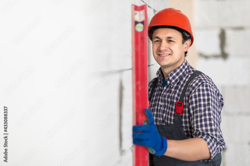 The inspectors are measuring the door frame level. To meet the standards real estate inspections or home inspections before delivering a home to customers. The inspectors are measuring the door frame level. To meet the standards real estate inspections or home inspections before delivering a home to customers.