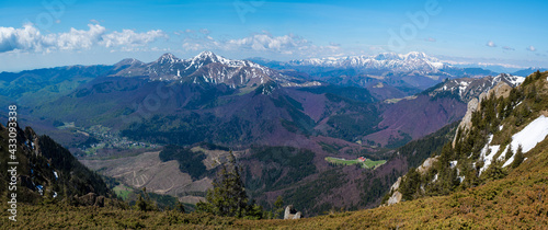 Aerial panoramic view of Ciucas mountain peaks and the skyline in the springtime in Romania - Europe