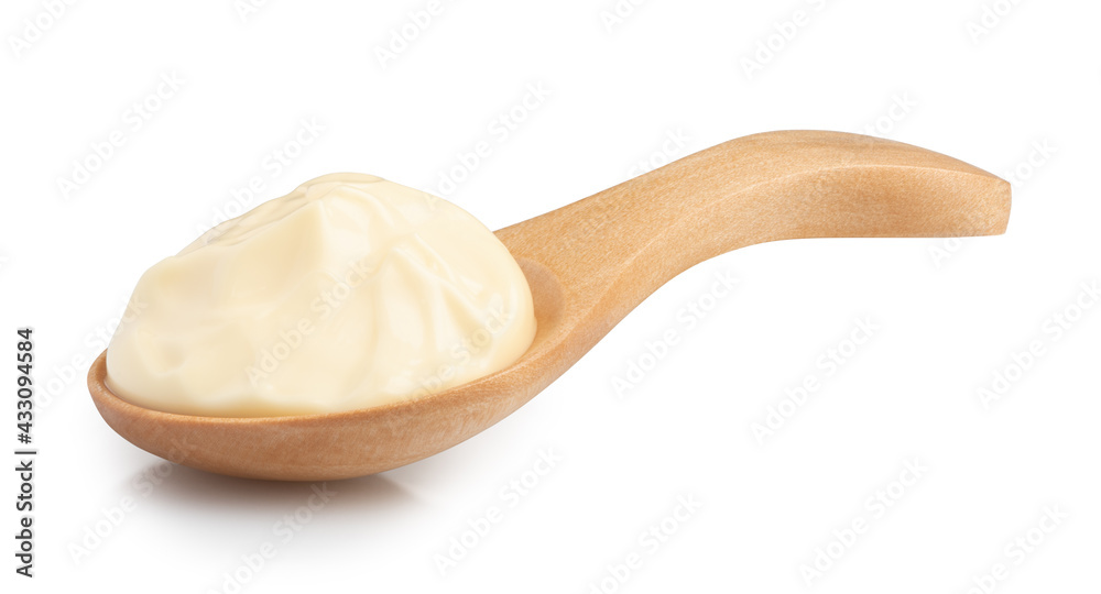 mayonnaise in a special wooden spoon for sauces isolated on white mayonnaise in a special wooden spoon for sauces isolated on white