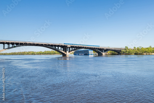 View from the Dnieper River in Kiev to the metro train. Horizon train on the bridge