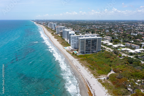 drone capture of florida beach with resorts © Aon Prestige Media