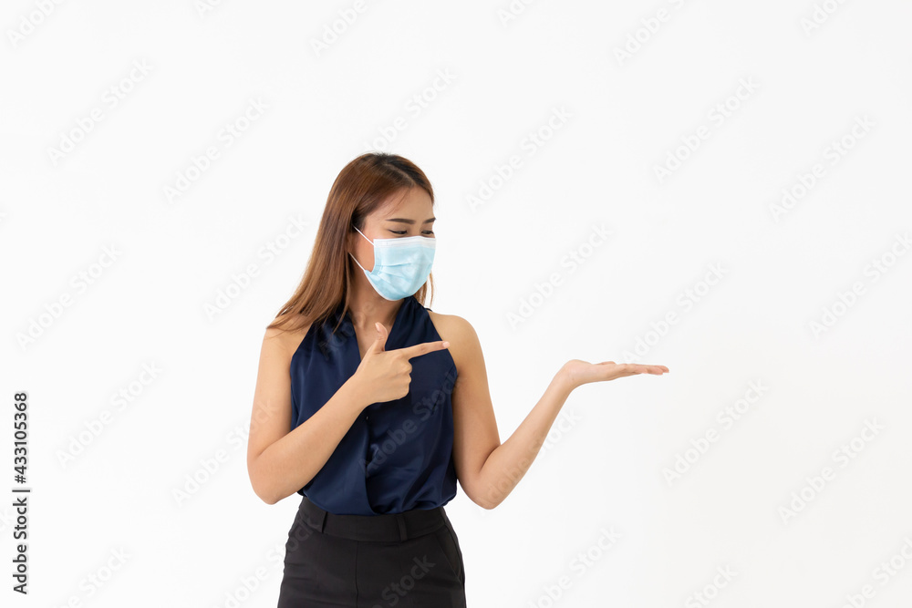 Business women wearing protective mask for corona virus. Business workers wear masks to protect and take care of their health during the Covid-19 outbreak. New normal working environment.