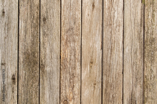 Brown natural old wood plank texture background. Weathered wooden surface seamless pattern