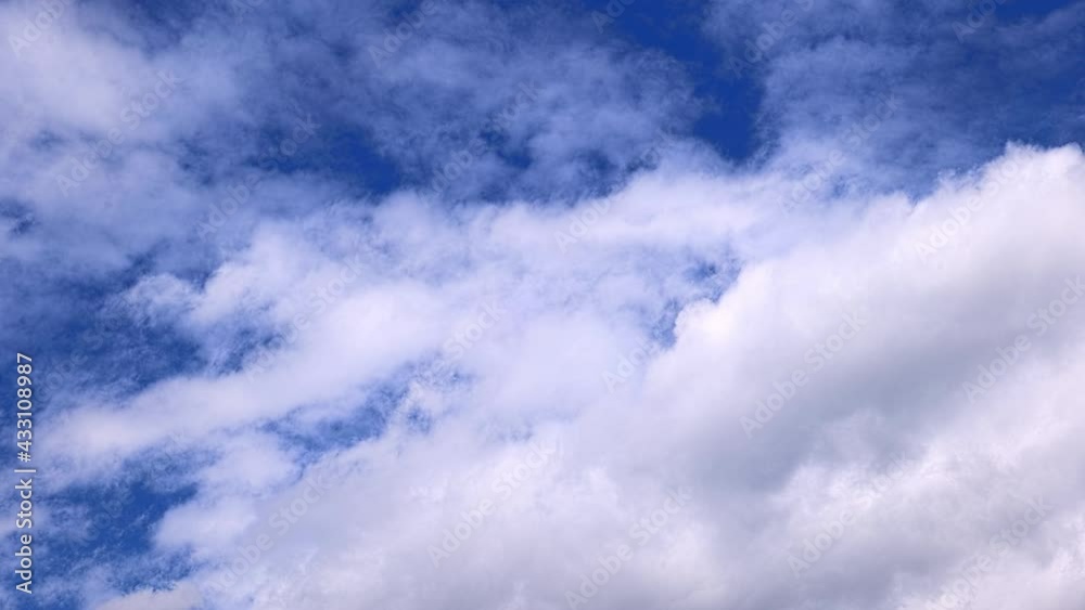 Very blue sky scene with cotton white clouds, 4K ProRes 422 10 bit. smooth cloud movement, sunny sky. Very blue sky scene with cotton white clouds, 4K ProRes 422 10 bit. smooth cloud movement, sunny sky.
