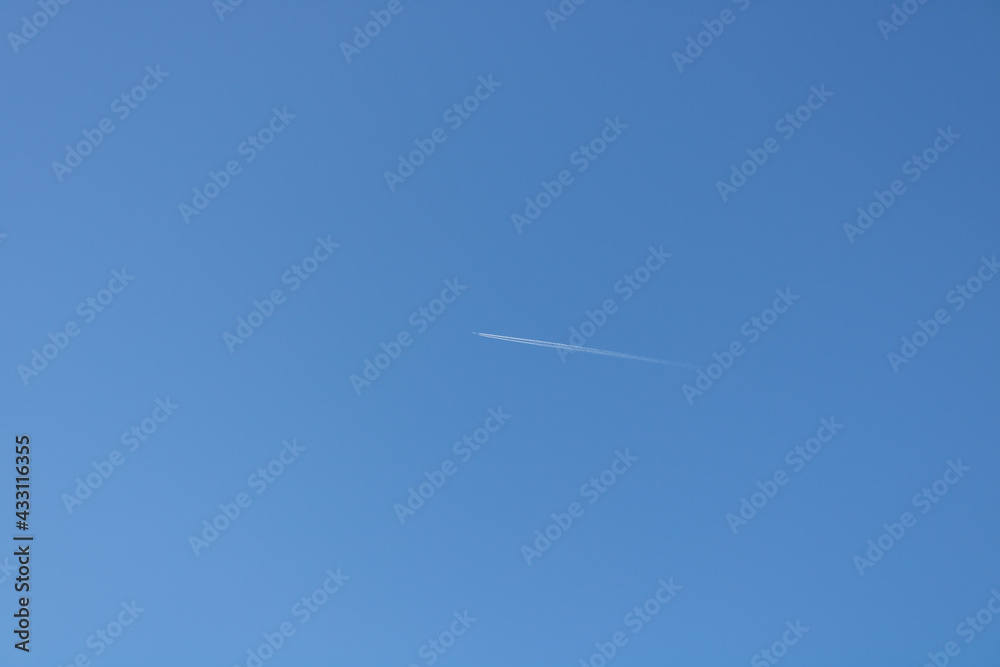 blue spring sky and a small plane blue spring sky and a small plane