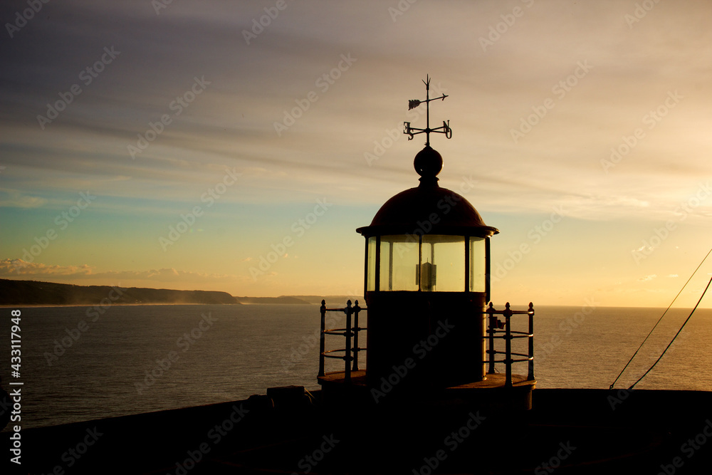 Silhouette of a lighthouse