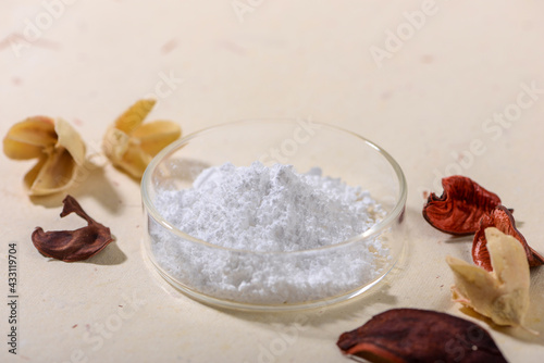 Allantoin powder on light background photo