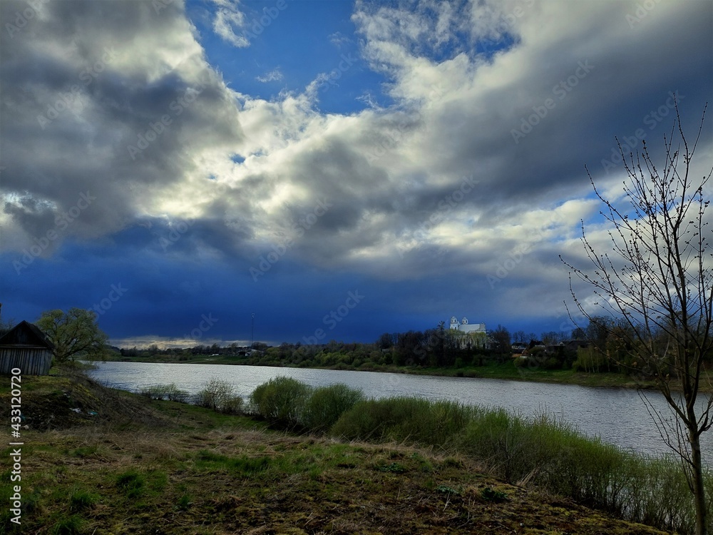 Clouds over the river in the countryside Clouds over the river in the countryside