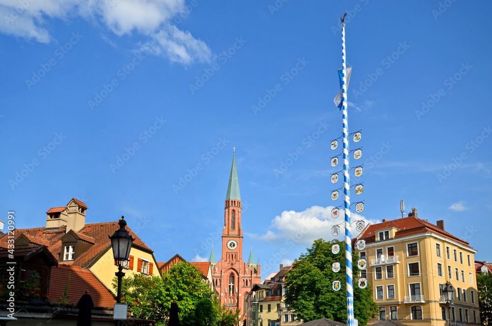 View to historical Maypole at square "Wiener Platz" near the Isar and the Gasteig in the old town of Munich-Haidhausen, Bavaria Germany Europe - obrazy, fototapety, plakaty 
