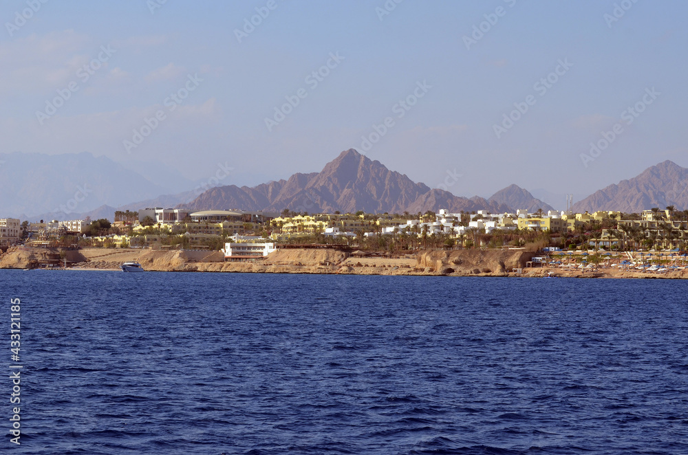 Resorts and hotels at coast of Sharm El Sheikh from yacht. Egypt