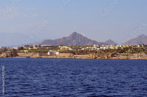 Resorts and hotels at coast of Sharm El Sheikh from yacht. Egypt