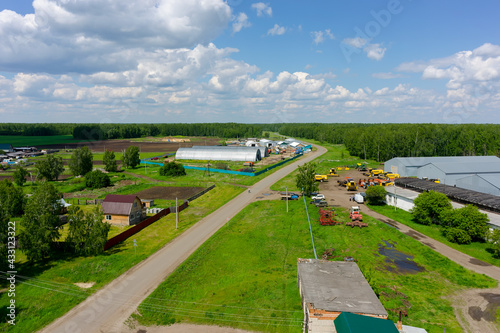 Farmer machine yard in Verhovina. Russia