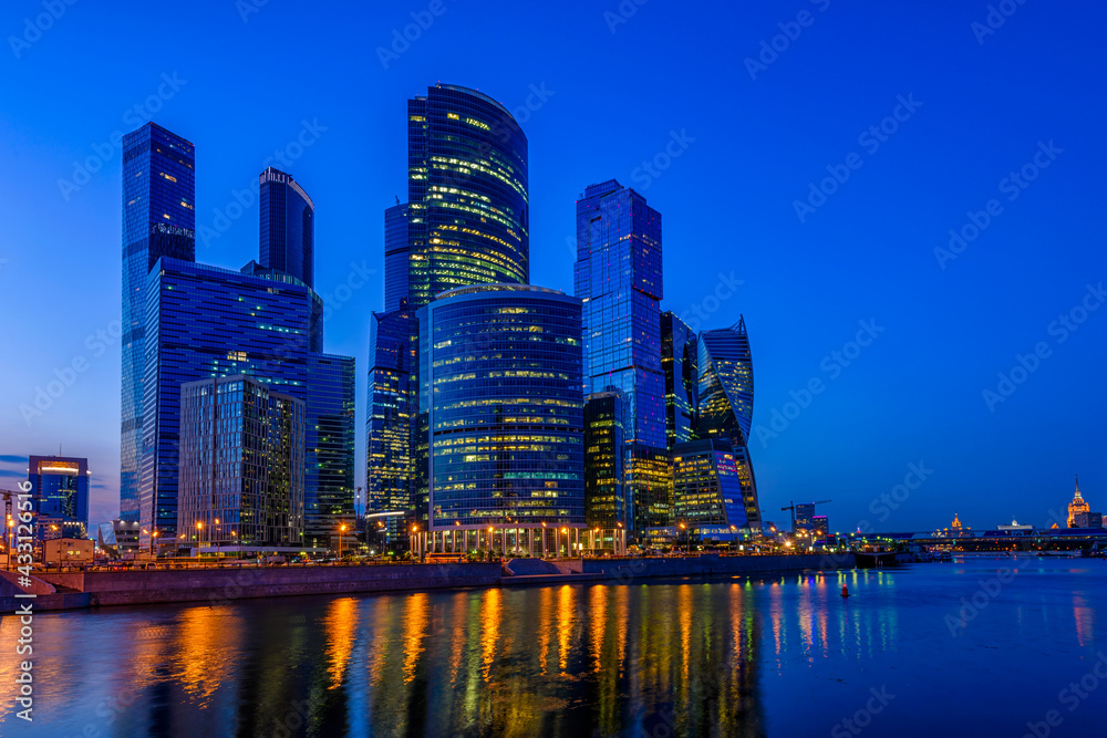 Skyscrapers of Moscow City business center and Moscow river in Moscow at night, Russia, Russia